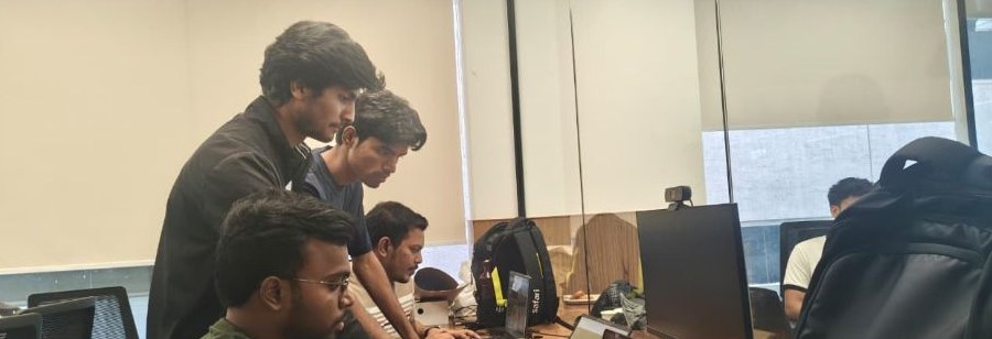 Team Techno Crackers debugging together at the venue